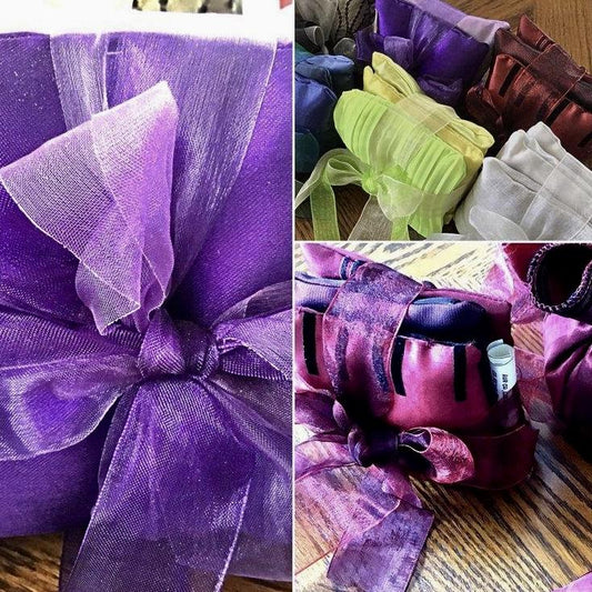 3 picture collage of pillow-like room sachets (purple, green, grey and brown sets, wrapped up in coloured ribbon)